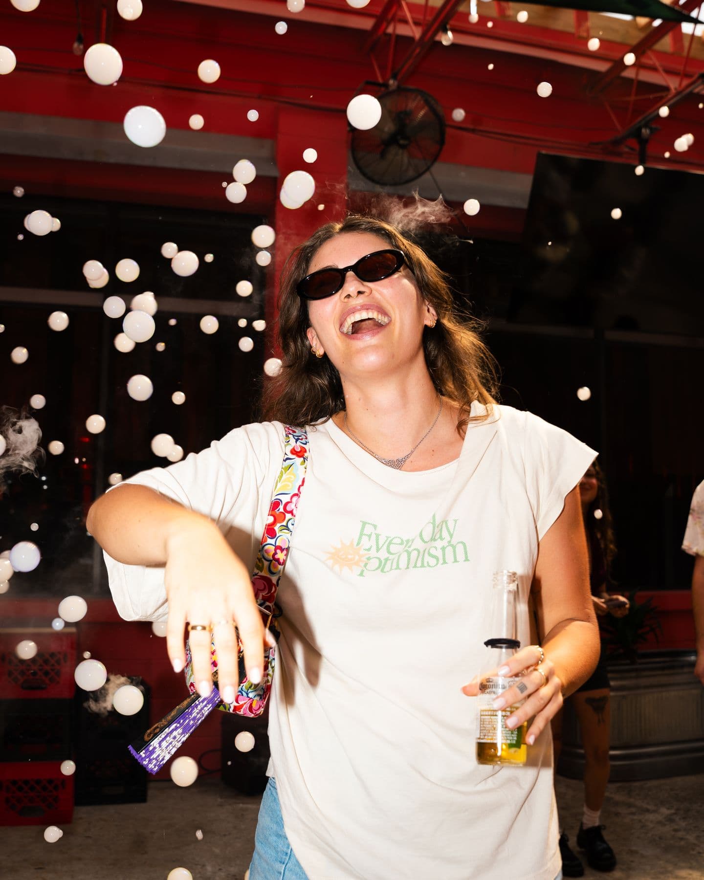 A Groover laughing as bubbles float past