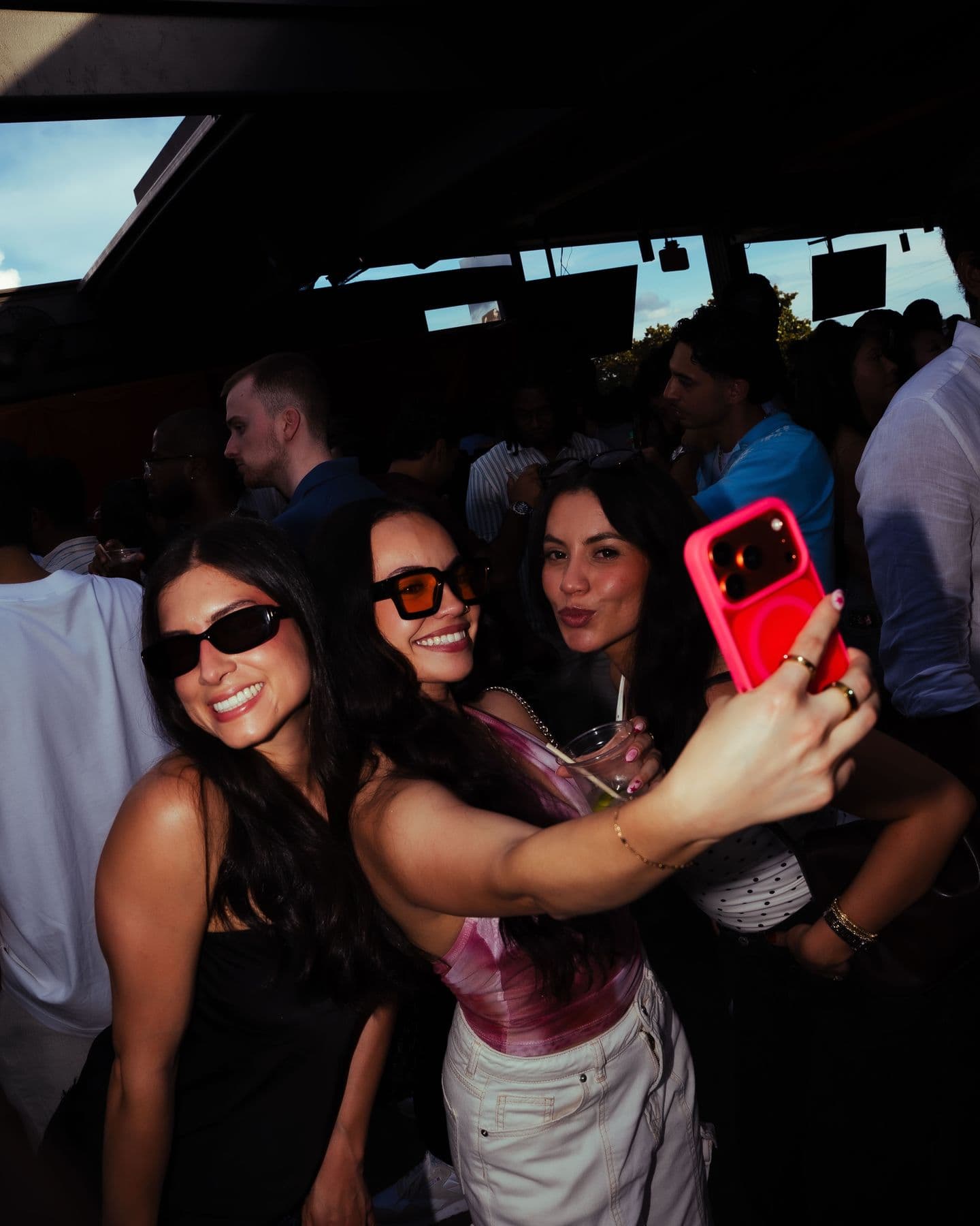 Friends taking a selfie mid-set